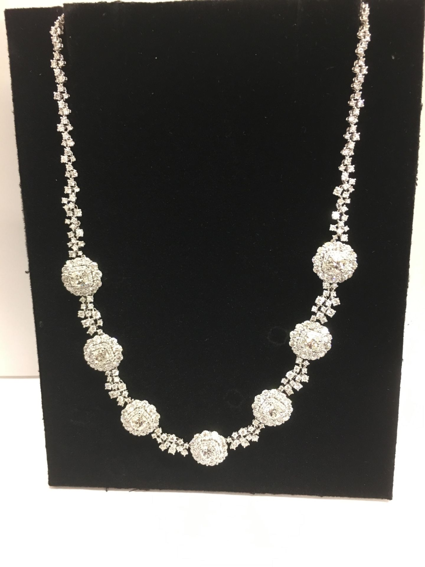 International diamond necklace ,7 cushion shape diamonds 1ct each total 7.33ct h colour si clarity,