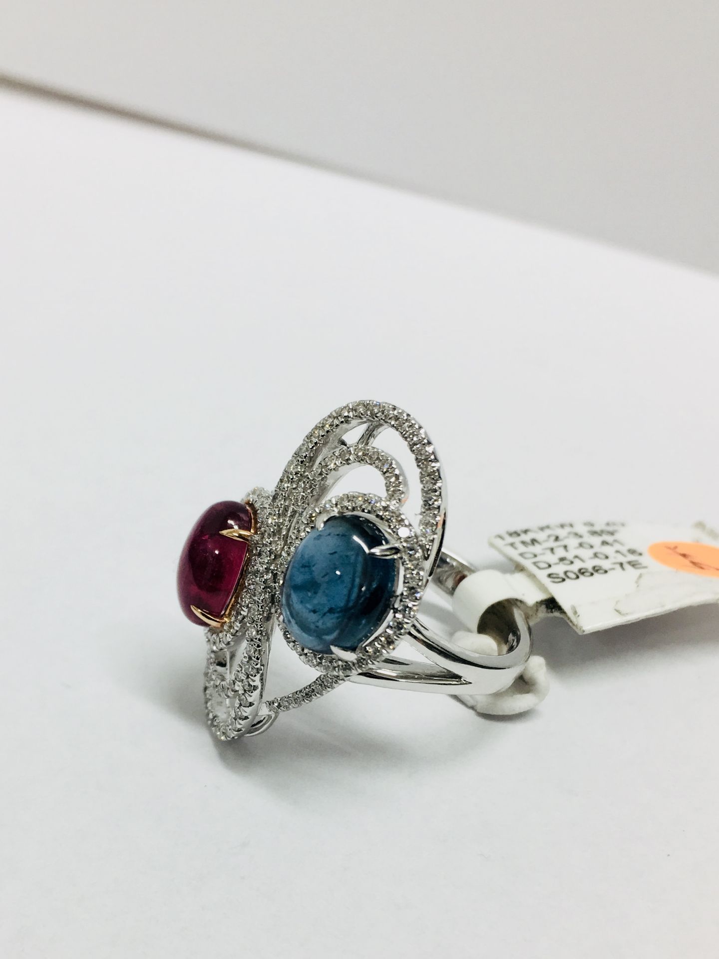 4ct sapphire and ruby dress ring,2ct sapphire ,2ct ruby cabouchon,154 round diamonds,h colour si - Image 4 of 4