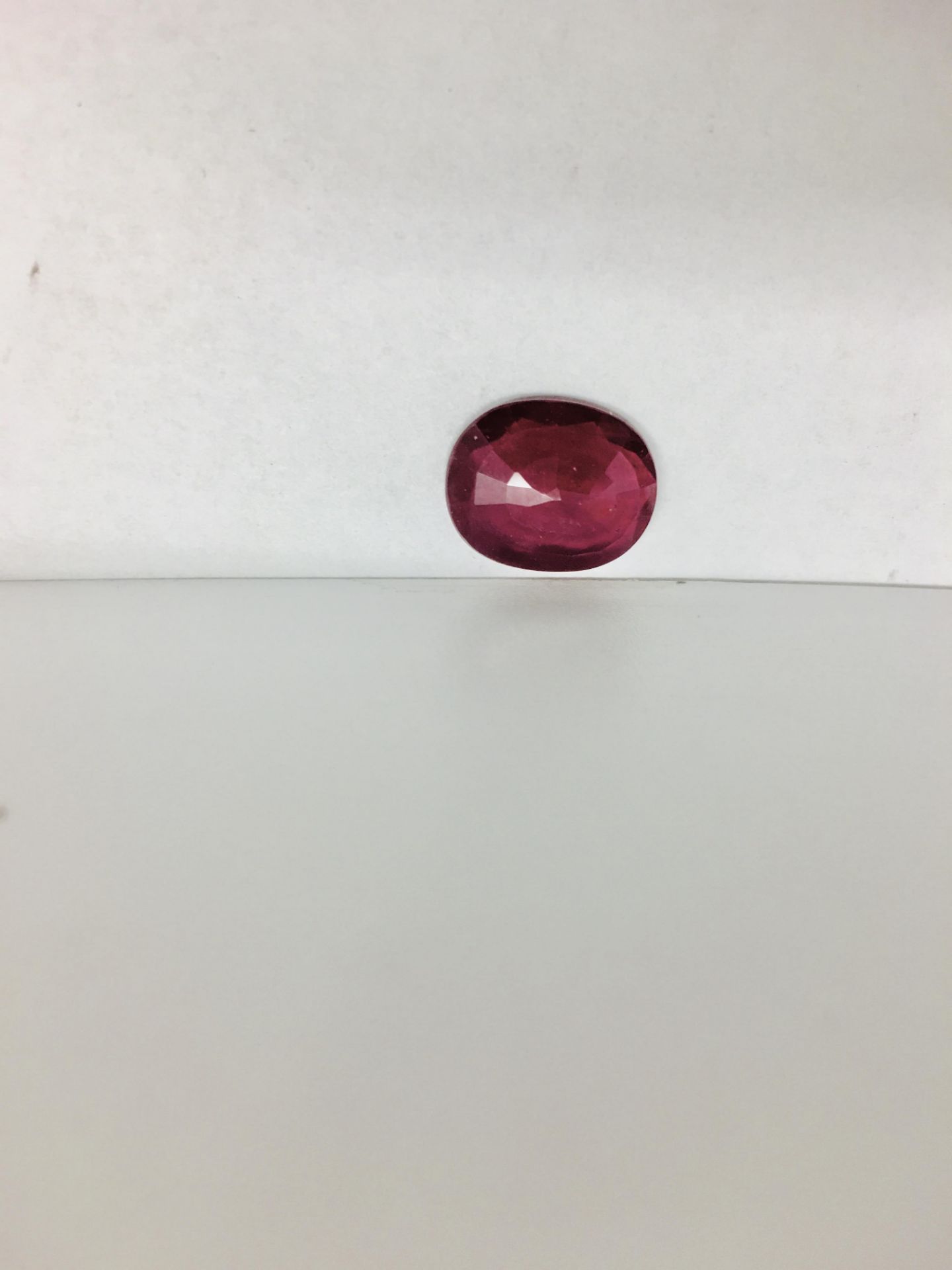 3.72ct ruby,Enhanced by Frature,good clarity and colour,12mmx10mm ,valued at 800 - Image 2 of 3