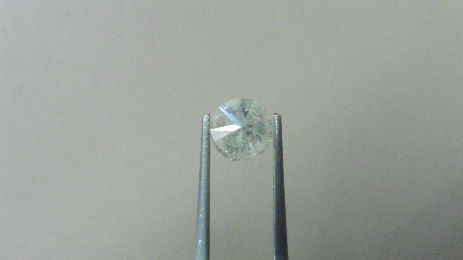 1.34ct Brilliant Cut Diamond, Enhanced stone. I colour, I2 clarity. . Valued at £1650