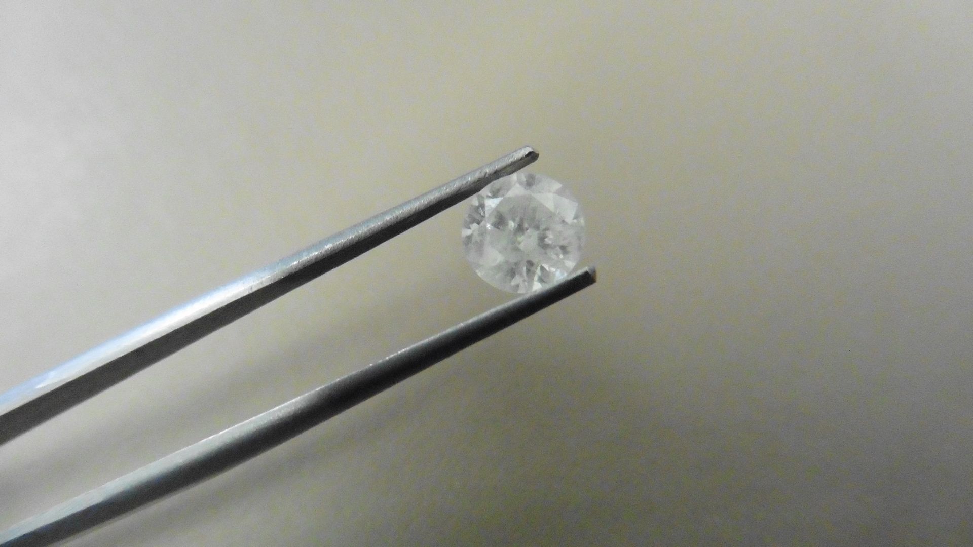 1.20ct Brilliant Cut Diamond, Enhanced stone. H colour, I2 clarity. . Valued at £1750