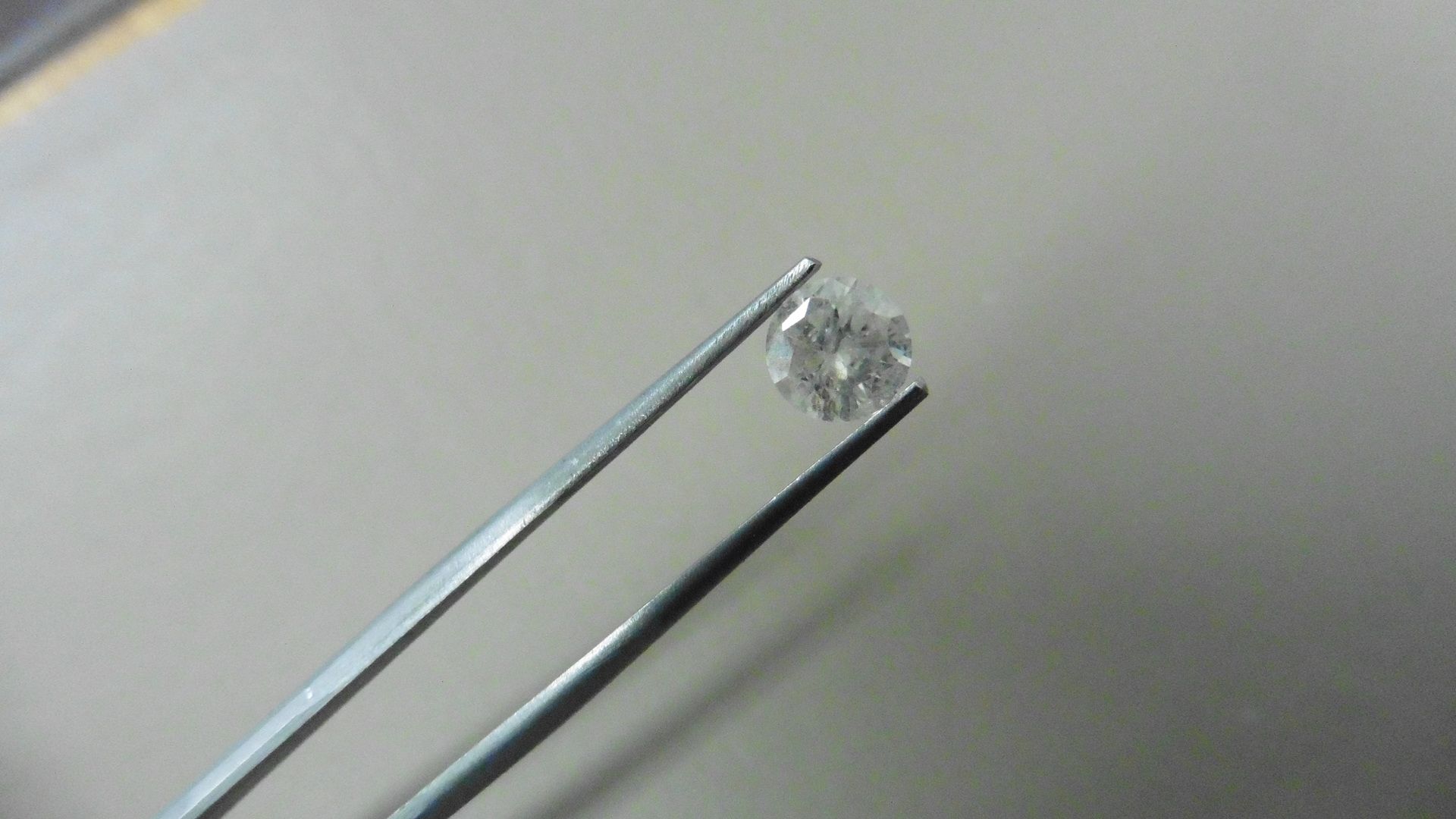 1.01ct Brilliant Cut Diamond, Enhanced stone.I colour, I2 clarity. . Valued at £1490