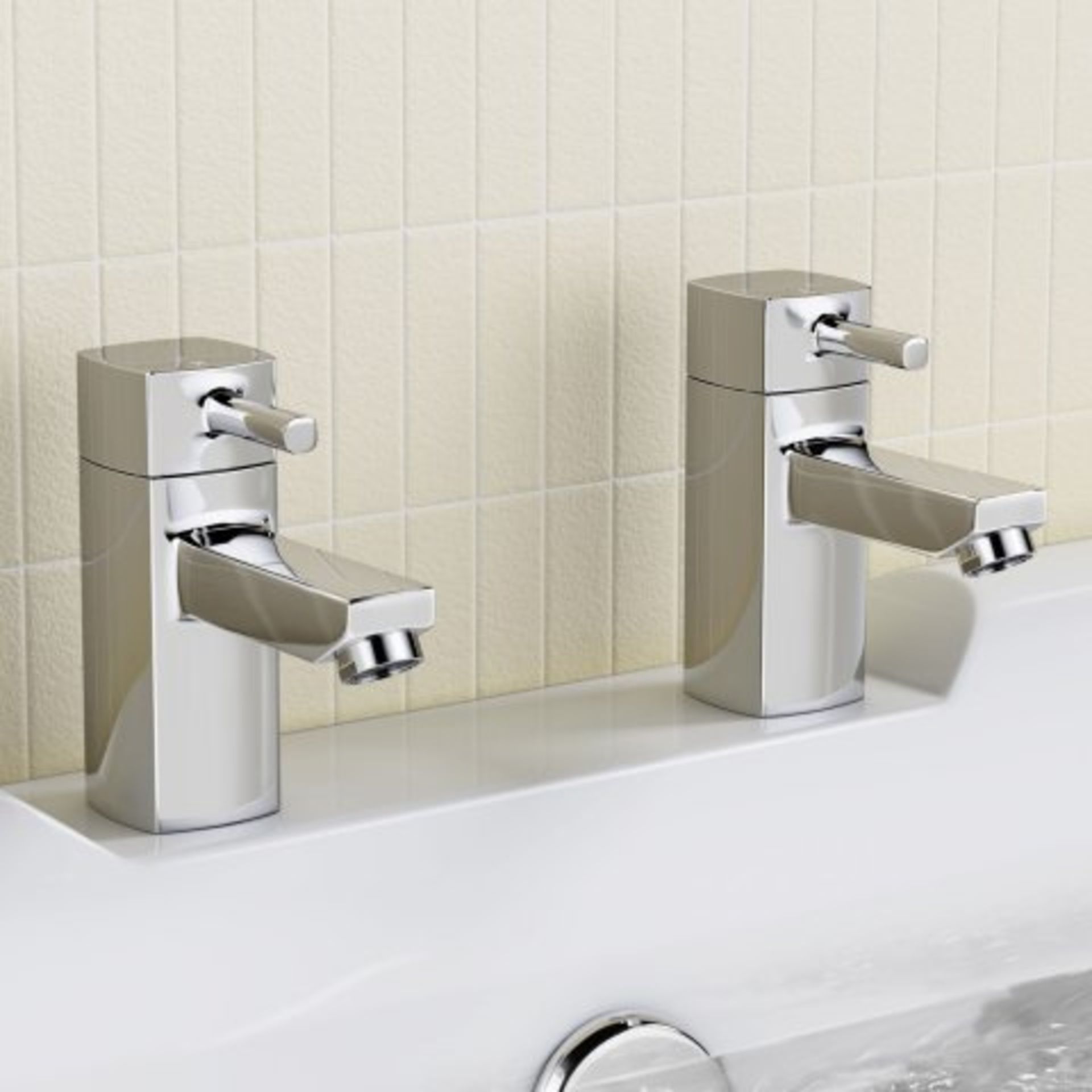(W203) Ivela Hot and Cold Bath Taps Presenting a contemporary design, this solid brass tap has