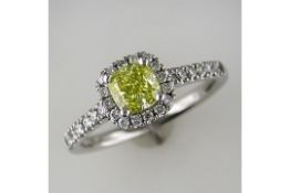 A New Cushion Cut Intense Yellow Diamond Halo Ring