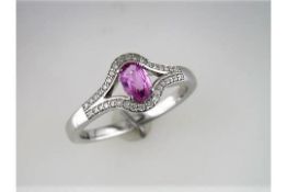 A Unused Pink Sapphire and Diamond Ring