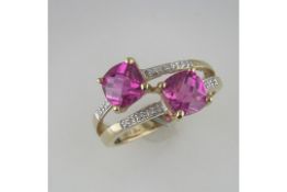 A "Restored" Pink Topaz and Diamond Crossover Ring