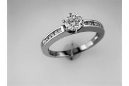 Solitaire Diamond Ring with Shoulder Diamonds