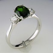 An Unused Oval Diopside With Diamonds