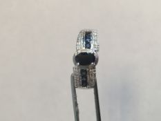 Platinum over sterling silver, Sapphire and diamond ring