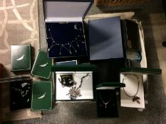 Large box of boxed costume jewellery