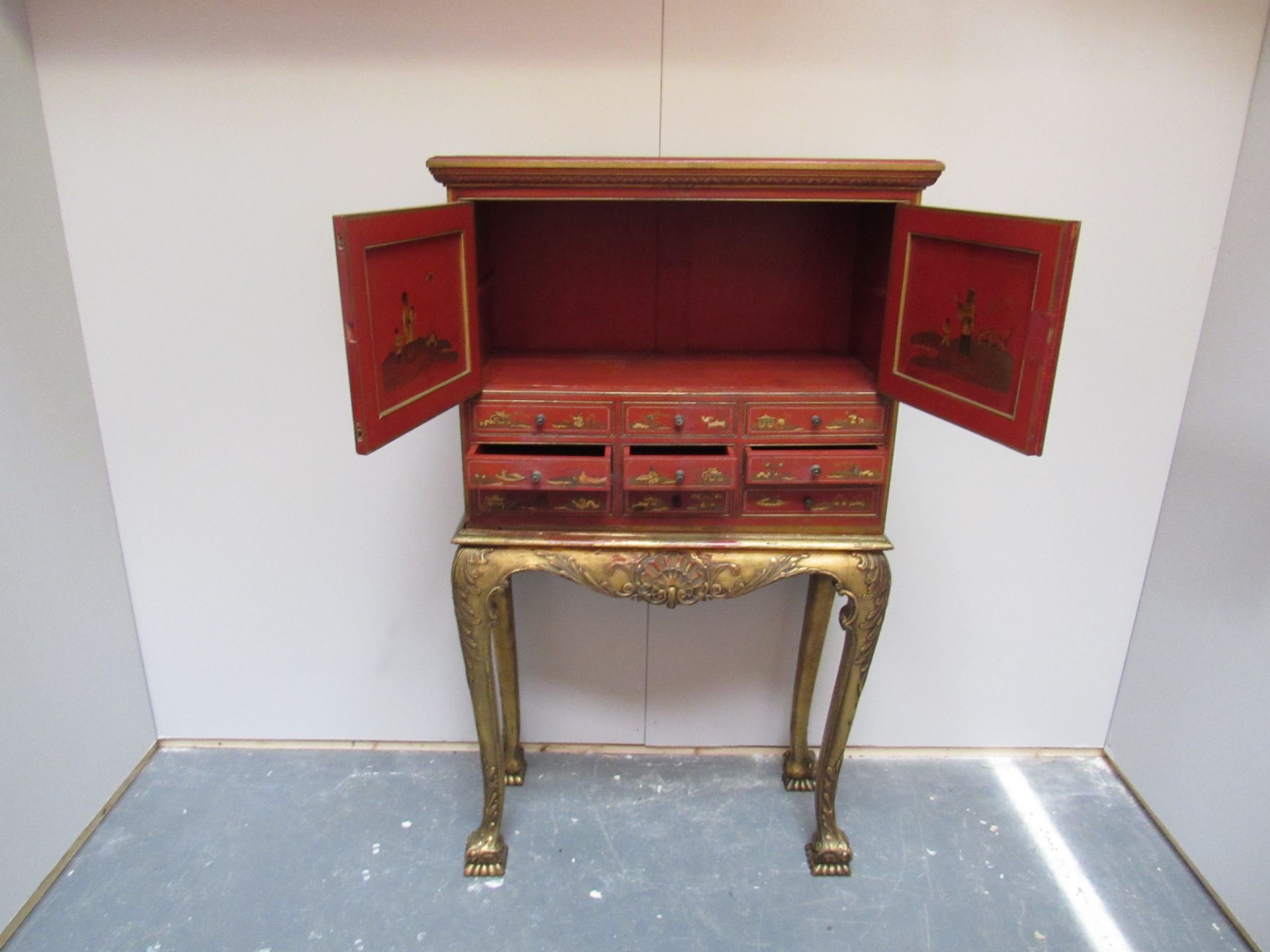 Red lacquered cabinet on a gilt stand raised on bold cabriole legs and bold carved club feet - Image 2 of 7