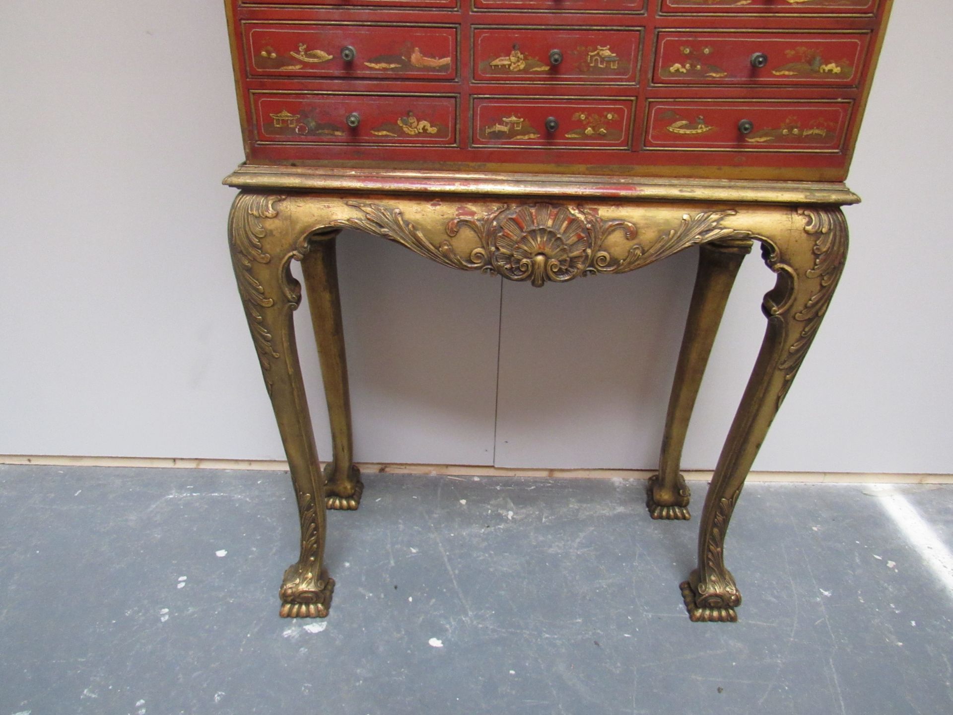 Red lacquered cabinet on a gilt stand raised on bold cabriole legs and bold carved club feet - Image 6 of 7