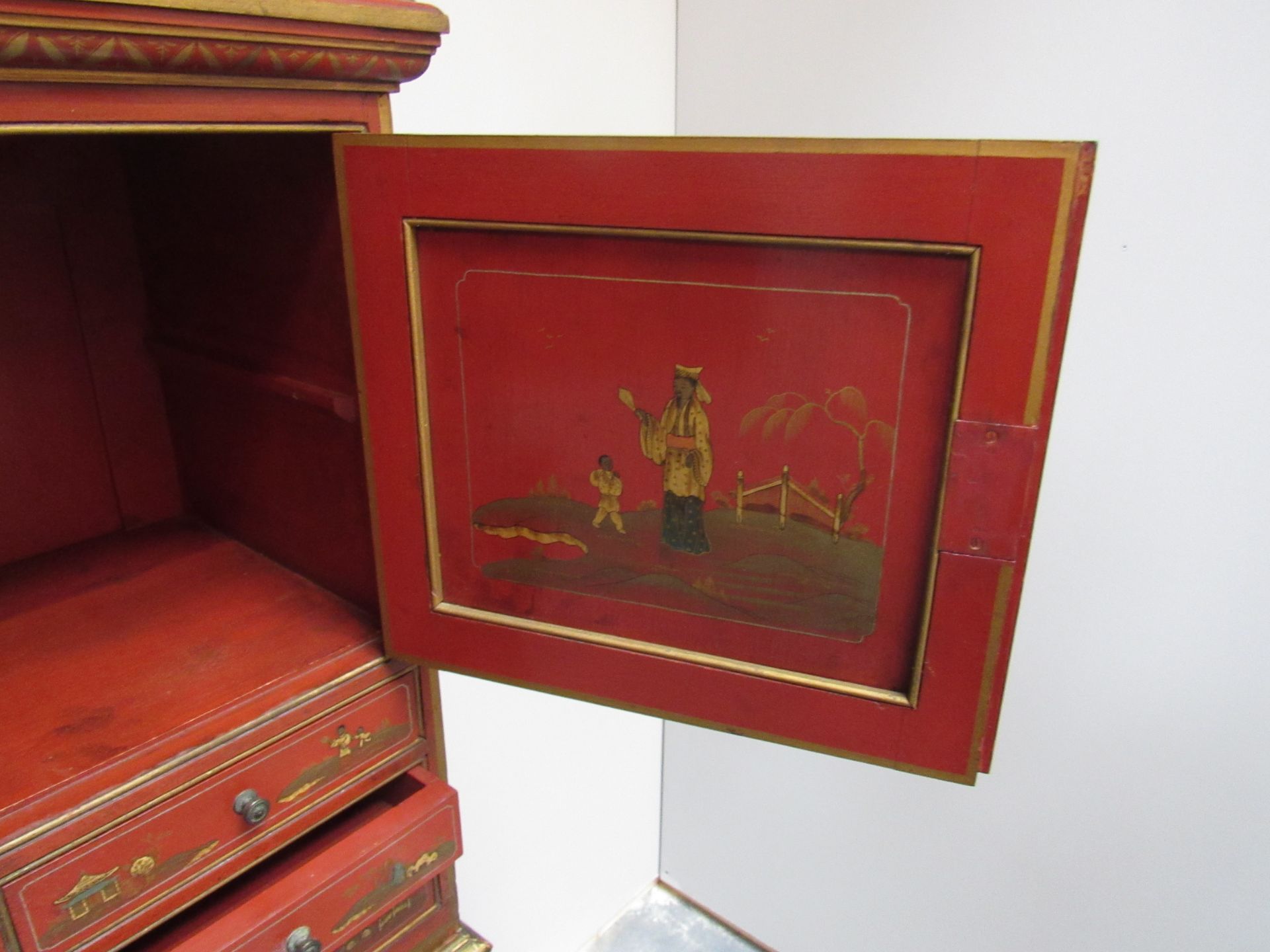 Red lacquered cabinet on a gilt stand raised on bold cabriole legs and bold carved club feet - Image 4 of 7