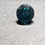 0.57 Ct natural fancy blue diamond certificate IGL. Natural stone.