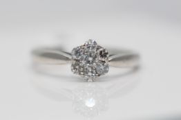 9ct White Gold Ldaies Diamond Ring, Set with Seven Diamond Solitaires