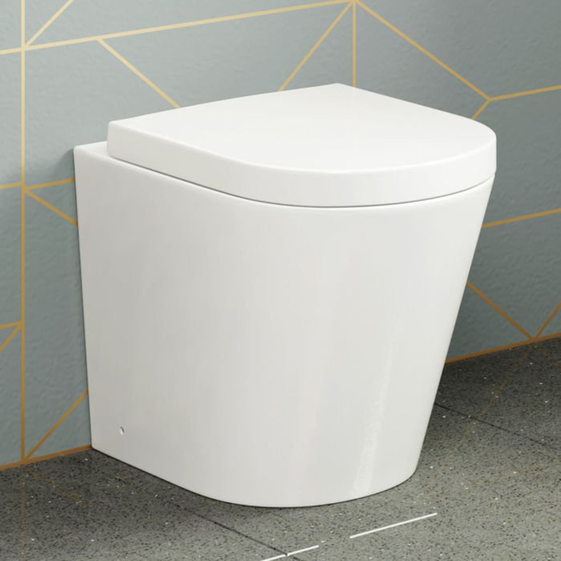 (M22) Lyon Back to Wall Toilet inc Luxury Soft Close Seat. RRP £349.99. Our Lyon back to wall toilet