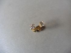 0.30ct Solitaire diamond stud earrings set with brilliant cut diamonds, SI2 clarity and I colour.