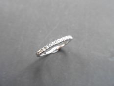 0.13ct diamond eternity ring set in 14ct white gold size L. I colour, si2 clarity in a micro claw