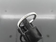 0.50ct full claw set diamond band ring set in 14ct white gold. Ring size M. I colour and i1 clarity.
