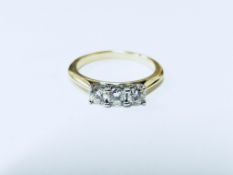 0.60ct diamond trilogy ring set in 18ct gold. Brilliant cut diamonds, I/J colour and Si3 clarity.