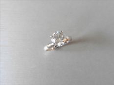 1.07ct diamond solitaire ring set in 18ct white gold. Brilliant cut diamond, H colour and I1