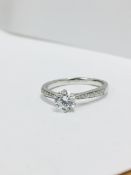 1ct diamond solitaire ring with diamond set shoulders,1.01ct natural brilliant cut diamond si2