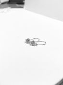 1.00ct drop earrings ,2x 0.50ct diamonds i colour i1 quality ,2.6 gms 18ct white.appraisal 1500.