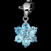 A Beautiful natural Swiss Blue Topaz Pendant - set with 7 Natural African Blue Topaz -