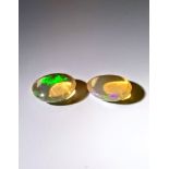 An unusual Pair IGL&I certified 3.00 Cts natural Multi Colour Ethiopian Opals.