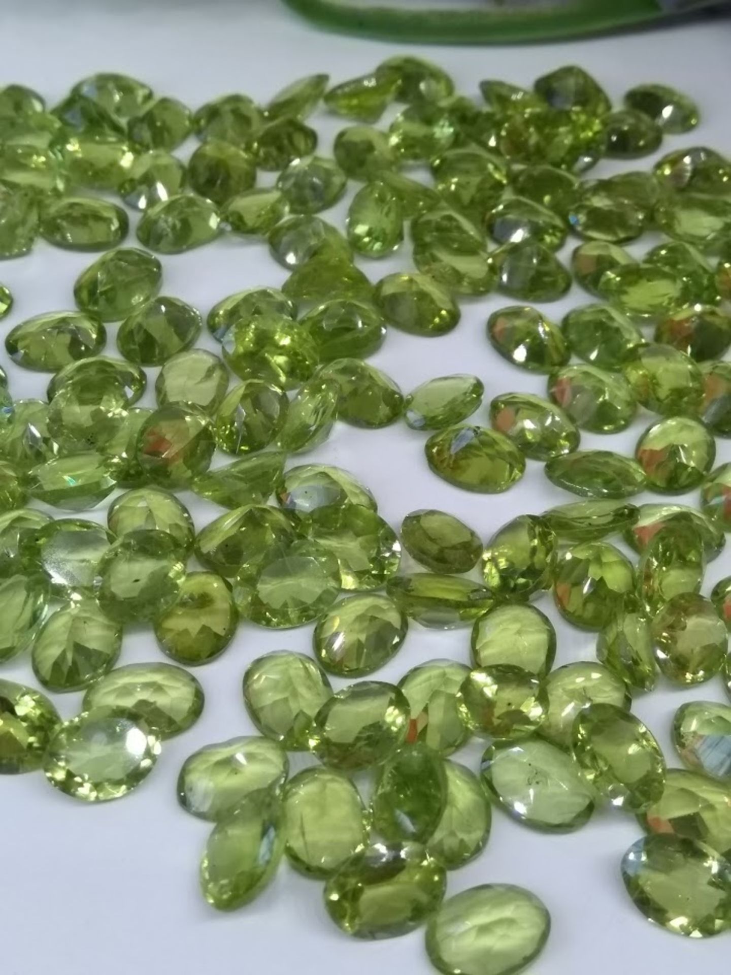 A fantastic 186.60 Cts 165 pieces Natural Peridot gemstones, Stunning parrot green Colour.