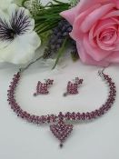 A Beautiful Natural Untreated Ruby Necklace & Earrings Collection - Individually AGI Certified.
