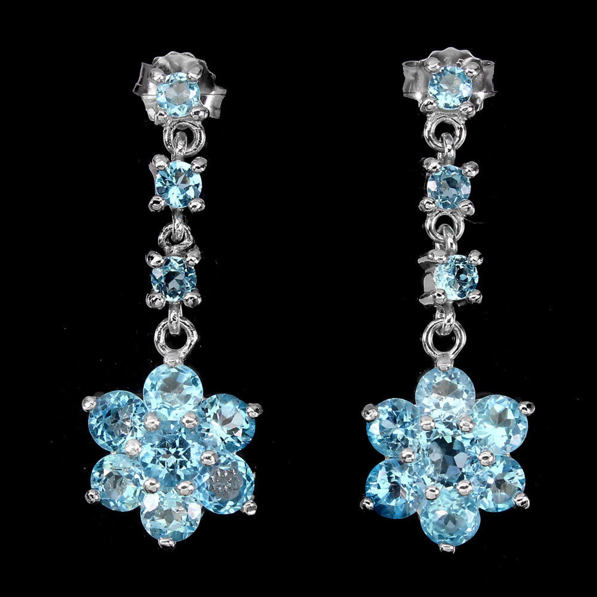 Beautiful Pair of Natural Swiss Blue Topaz Earrings, set with 10 Natural Blue Topaz in each Earring.