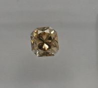 An unmounted Radiant-shaped diamond weighing app. 0.57ct. Colour : Brown .Clarity :VS1