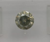 An unmounted Round-shaped diamond weighing app. 1.04ct. Colour : Brown .Clarity :I1