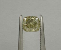 An unmounted Cushion-shaped diamond weighing app. 1.01ct. Colour : Yellow .Clarity :I1