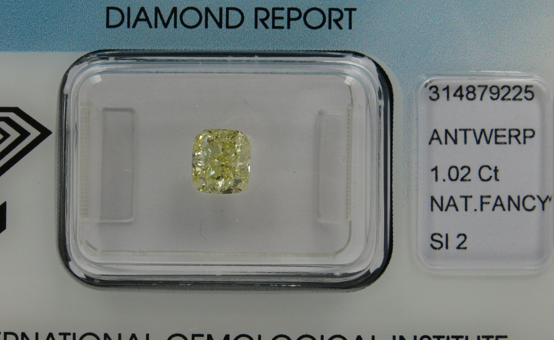 An unmounted Cushion-shaped diamond weighing app. 1.02ct. Colour : Yellow .Clarity :SI2