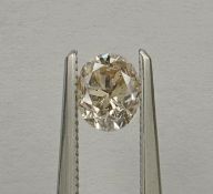 An unmounted Oval-shaped diamond weighing app. 0.78ct. Colour : Brown .Clarity :SI2