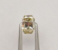 An unmounted Radiant-shaped diamond weighing app. 0.74ct. Colour : Brown .Clarity :SI1
