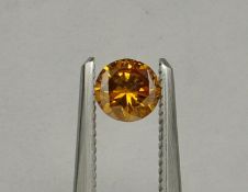 An unmounted Round-shaped diamond weighing app. 0.35ct. Colour : Orange Yellow .Clarity :I1