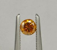 An unmounted Round-shaped diamond weighing app. 0.27ct. Colour : Yellow .Clarity :SI2