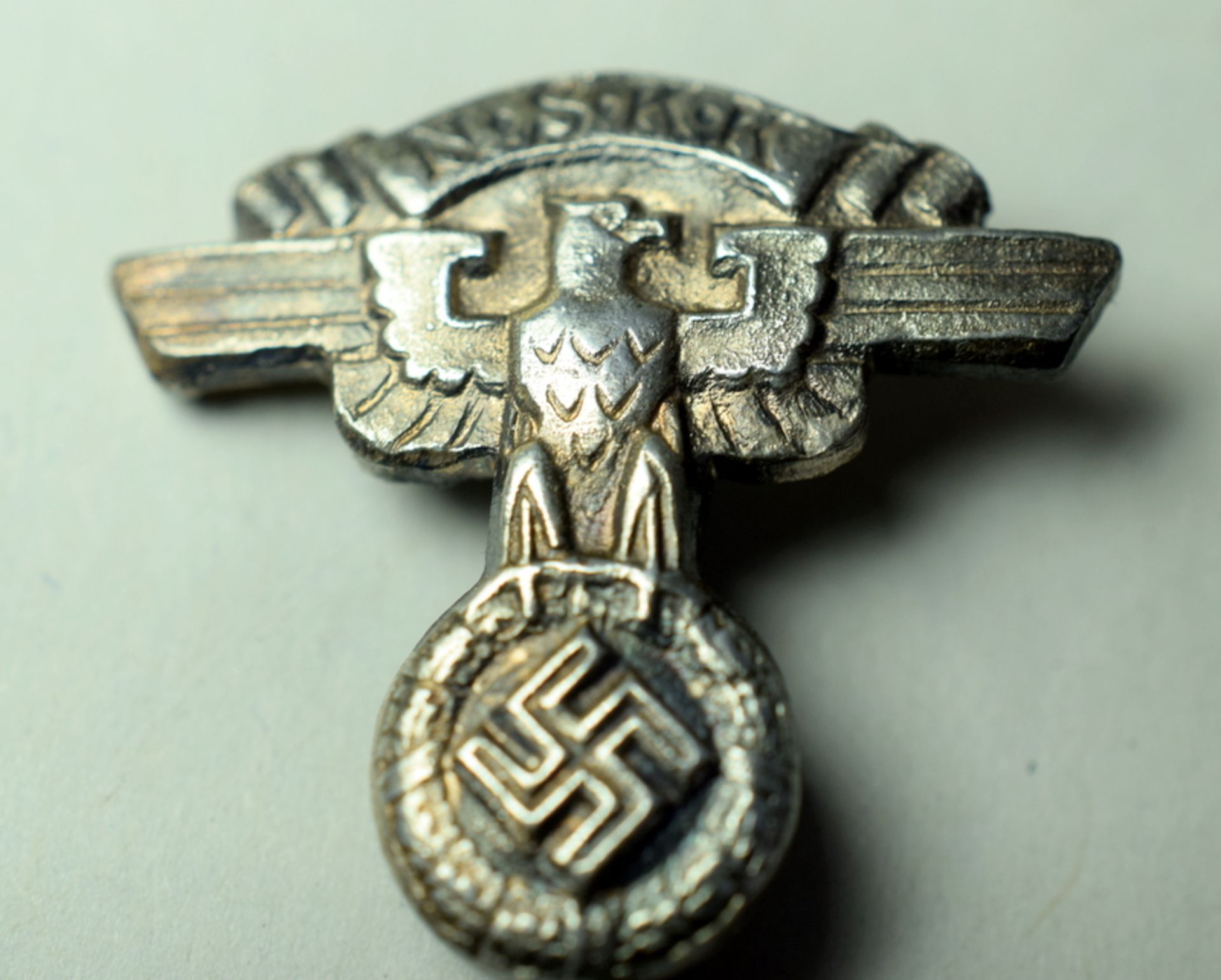 NSKK White Metal German Lapel Badge