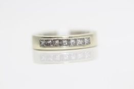 White gold Half eternity ring set with 0.63 carats of princess cut diamonds, Clarity- VS2, Colour-