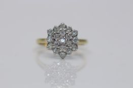 18ct Yellow Gold Ladies diamond cluster ring, set with 19 brilliant cut diamond solitaires, Approx
