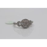 14ct White Gold Diamond Ring, set in a halo setting, with pave set diamonds