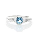 9ct White Gold Channel Set Semi Eternity Diamond Blue Topaz Ring 0.10 Carats