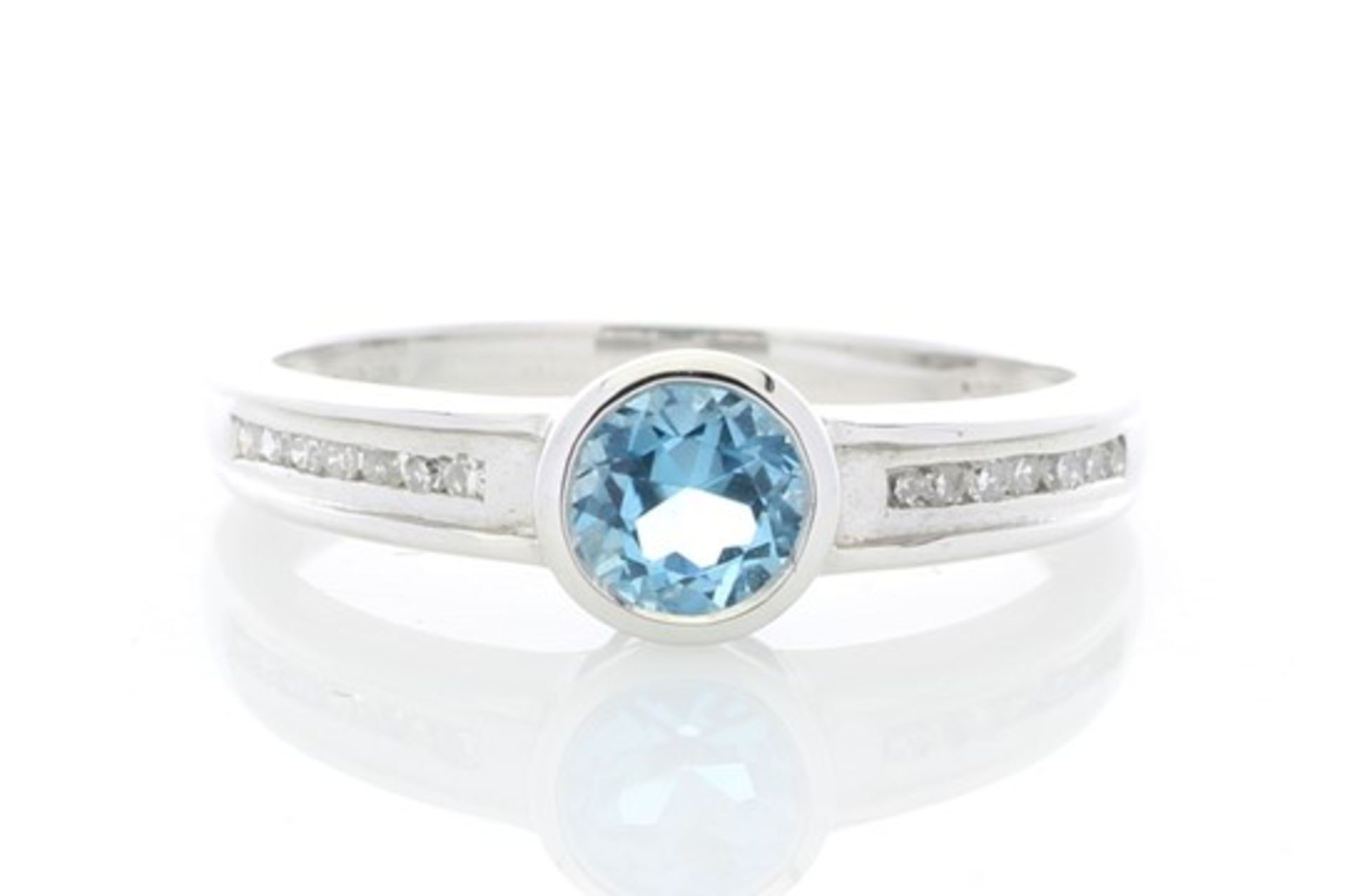 9ct White Gold Channel Set Semi Eternity Diamond Blue Topaz Ring 0.10 Carats