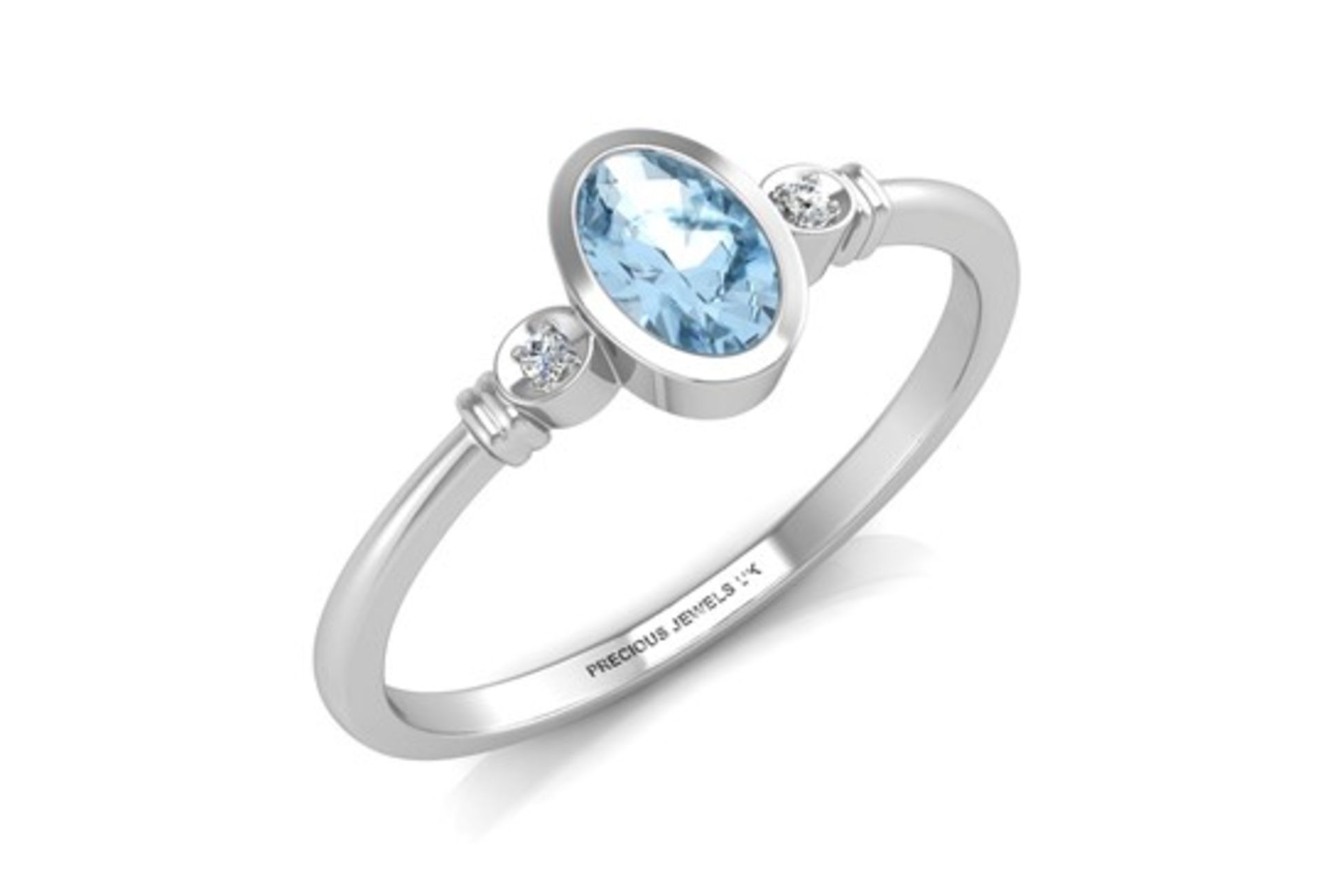 9ct White Gold Diamond And Oval Shape Blue Topaz Ring 0.01 Carats