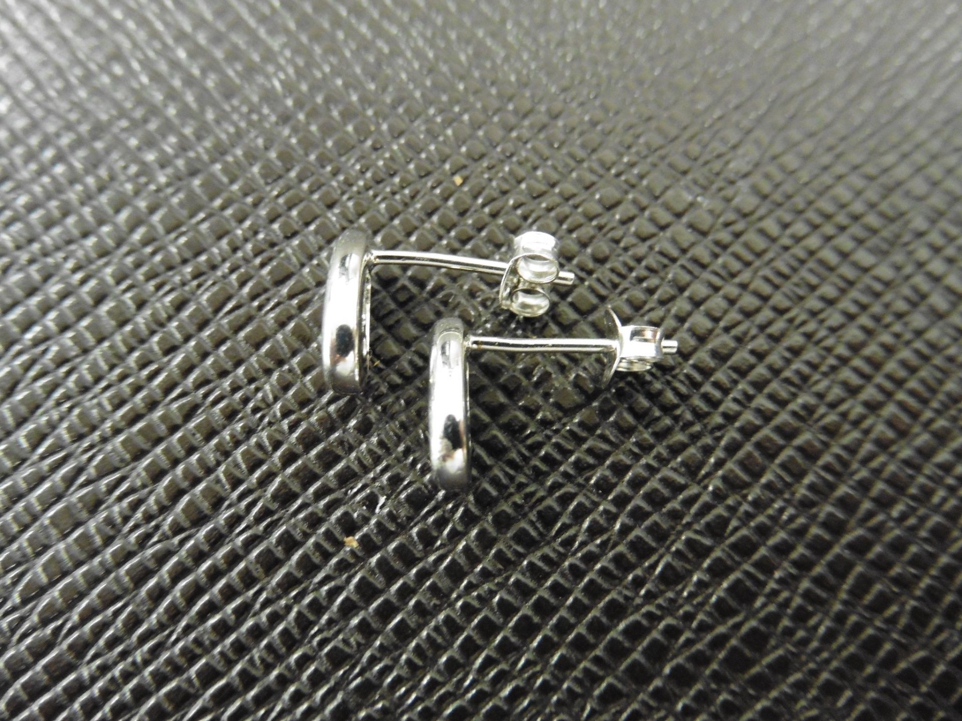 0.20ct diamond earrings set in platinum 950. 2 small brilliant cut diamonds, H/I colourand si2 - Image 3 of 3