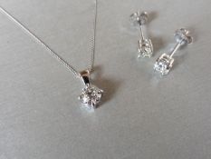 0.35ct / 0.70ct diamond pendant and earring set in platinum. Pendant - 0.35ct brilliant cut diamond,