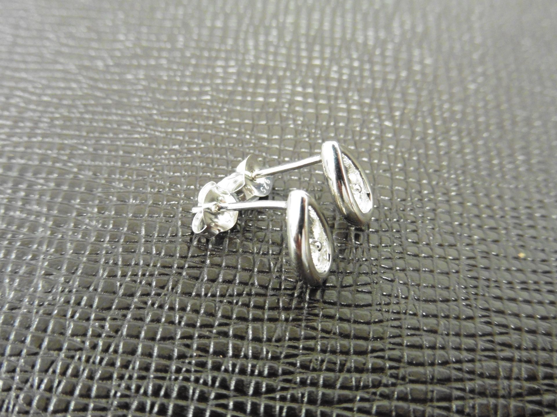 0.20ct diamond earrings set in platinum 950. 2 small brilliant cut diamonds, H/I colourand si2 - Image 2 of 3